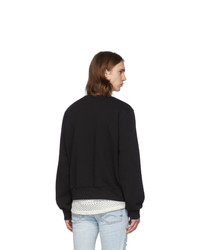 schwarzes und weißes bedrucktes Sweatshirt von Amiri