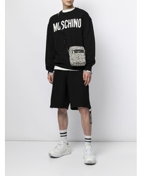 schwarzes und weißes bedrucktes Sweatshirt von Moschino