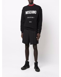 schwarzes und weißes bedrucktes Sweatshirt von Moschino