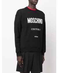 schwarzes und weißes bedrucktes Sweatshirt von Moschino