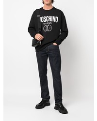 schwarzes und weißes bedrucktes Sweatshirt von Moschino