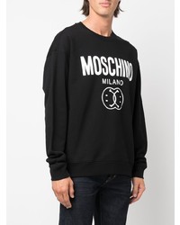 schwarzes und weißes bedrucktes Sweatshirt von Moschino