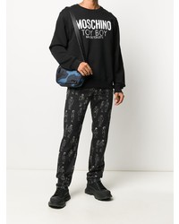 schwarzes und weißes bedrucktes Sweatshirt von Moschino