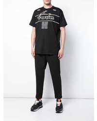 schwarzes und weißes bedrucktes T-Shirt mit einem Rundhalsausschnitt von Givenchy