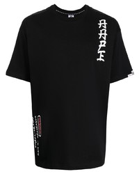 schwarzes und weißes bedrucktes T-Shirt mit einem Rundhalsausschnitt von AAPE BY A BATHING APE