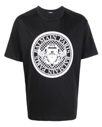 schwarzes und weißes bedrucktes T-Shirt mit einem Rundhalsausschnitt von Balmain