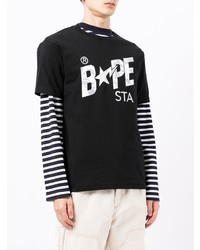 schwarzes und weißes bedrucktes T-Shirt mit einem Rundhalsausschnitt von A Bathing Ape