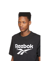 schwarzes und weißes bedrucktes T-Shirt mit einem Rundhalsausschnitt von Reebok Classics