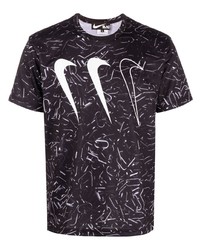 schwarzes und weißes bedrucktes T-Shirt mit einem Rundhalsausschnitt von Black Comme Des Garçons