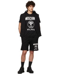 schwarzes und weißes bedrucktes T-Shirt mit einem Rundhalsausschnitt von Moschino