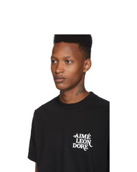schwarzes und weißes bedrucktes T-Shirt mit einem Rundhalsausschnitt von Aimé Leon Dore