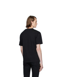 schwarzes und weißes bedrucktes T-Shirt mit einem Rundhalsausschnitt von McQ Alexander McQueen