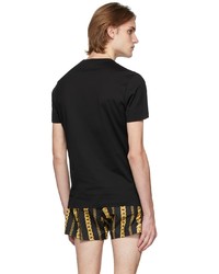 schwarzes und weißes bedrucktes T-Shirt mit einem Rundhalsausschnitt von Versace