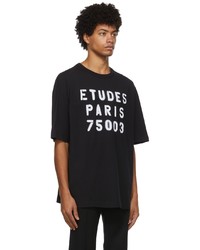 schwarzes und weißes bedrucktes T-Shirt mit einem Rundhalsausschnitt von Études