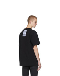 schwarzes und weißes bedrucktes T-Shirt mit einem Rundhalsausschnitt von Vetements