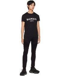 schwarzes und weißes bedrucktes T-Shirt mit einem Rundhalsausschnitt von Balmain