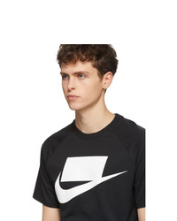 schwarzes und weißes bedrucktes T-Shirt mit einem Rundhalsausschnitt von Nike