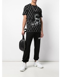 schwarzes und weißes bedrucktes T-Shirt mit einem Rundhalsausschnitt von Off-White