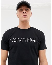schwarzes und weißes bedrucktes T-Shirt mit einem Rundhalsausschnitt von Calvin Klein