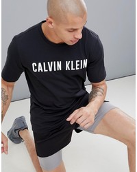 schwarzes und weißes bedrucktes T-Shirt mit einem Rundhalsausschnitt von Calvin Klein Performance