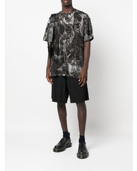 schwarzes und weißes bedrucktes T-Shirt mit einem Rundhalsausschnitt von Comme Des Garcons Homme Plus