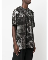 schwarzes und weißes bedrucktes T-Shirt mit einem Rundhalsausschnitt von Comme Des Garcons Homme Plus