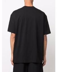 schwarzes und weißes bedrucktes T-Shirt mit einem Rundhalsausschnitt von Comme Des Garcons SHIRT