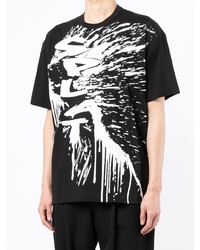 schwarzes und weißes bedrucktes T-Shirt mit einem Rundhalsausschnitt von Comme Des Garcons SHIRT