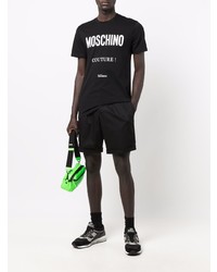 schwarzes und weißes bedrucktes T-Shirt mit einem Rundhalsausschnitt von Moschino