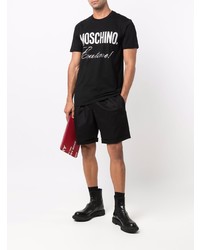 schwarzes und weißes bedrucktes T-Shirt mit einem Rundhalsausschnitt von Moschino