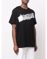 schwarzes und weißes bedrucktes T-Shirt mit einem Rundhalsausschnitt von Balmain