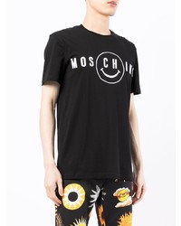 schwarzes und weißes bedrucktes T-Shirt mit einem Rundhalsausschnitt von Moschino