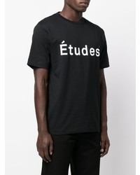 schwarzes und weißes bedrucktes T-Shirt mit einem Rundhalsausschnitt von Études