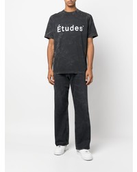 schwarzes und weißes bedrucktes T-Shirt mit einem Rundhalsausschnitt von Études