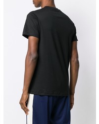 schwarzes und weißes bedrucktes T-Shirt mit einem Rundhalsausschnitt von Facetasm