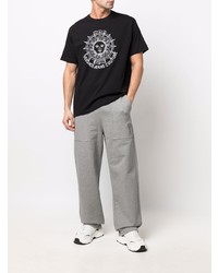 schwarzes und weißes bedrucktes T-Shirt mit einem Rundhalsausschnitt von VERSACE JEANS COUTURE