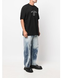 schwarzes und weißes bedrucktes T-Shirt mit einem Rundhalsausschnitt von Vetements