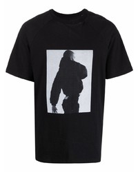 schwarzes und weißes bedrucktes T-Shirt mit einem Rundhalsausschnitt von Heliot Emil
