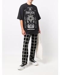 schwarzes und weißes bedrucktes T-Shirt mit einem Rundhalsausschnitt von Vetements