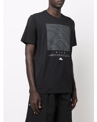schwarzes und weißes bedrucktes T-Shirt mit einem Rundhalsausschnitt von Jordan