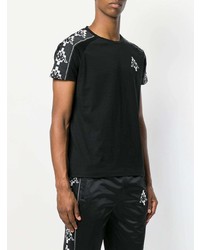 schwarzes und weißes bedrucktes T-Shirt mit einem Rundhalsausschnitt von Marcelo Burlon County of Milan