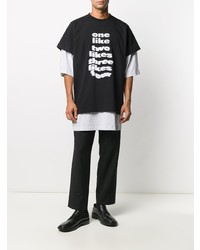 schwarzes und weißes bedrucktes T-Shirt mit einem Rundhalsausschnitt von Balenciaga