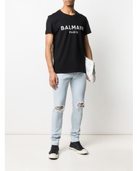 schwarzes und weißes bedrucktes T-Shirt mit einem Rundhalsausschnitt von Balmain