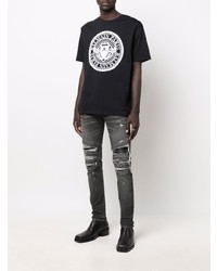 schwarzes und weißes bedrucktes T-Shirt mit einem Rundhalsausschnitt von Balmain