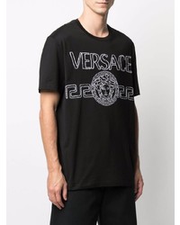 schwarzes und weißes bedrucktes T-Shirt mit einem Rundhalsausschnitt von Versace