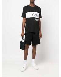 schwarzes und weißes bedrucktes T-Shirt mit einem Rundhalsausschnitt von Calvin Klein Jeans