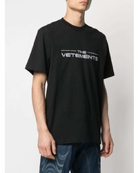 schwarzes und weißes bedrucktes T-Shirt mit einem Rundhalsausschnitt von Vetements