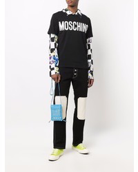 schwarzes und weißes bedrucktes T-Shirt mit einem Rundhalsausschnitt von Moschino