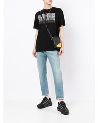 schwarzes und weißes bedrucktes T-Shirt mit einem Rundhalsausschnitt von Armani Exchange