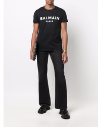 schwarzes und weißes bedrucktes T-Shirt mit einem Rundhalsausschnitt von Balmain